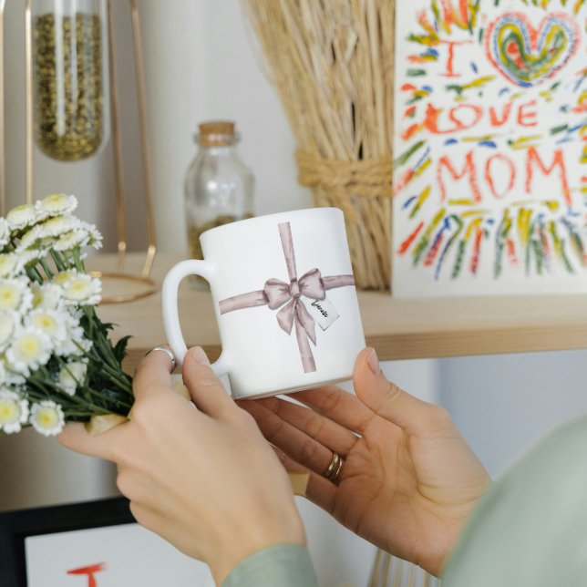 Taza De Café Envuelto en un arco rosa (Subido por el creador)