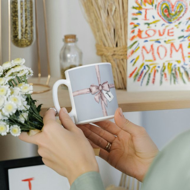 Taza De Café Envuelto en un arco rosa (Subido por el creador)
