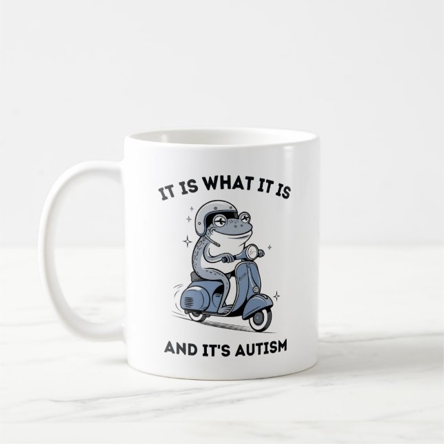 Taza De Café Es lo que es y es autismo, rana divertida (Izquierda)