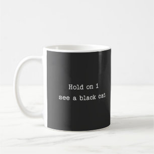 Taza De Café Espera, veo un gato negro