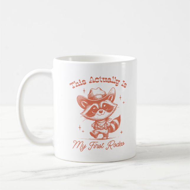 Taza De Café Este Es Mi Primer Rodeo Raccoon Cowboy (Izquierda)