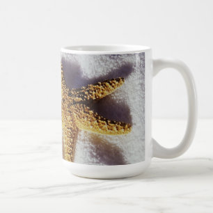 Taza De Café Estrellas de mar en una toalla