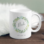 Taza De Café Eucalyptus Wreath Bride<br><div class="desc">Un dulce y elegante trineo de bodas,  el tazón presenta una corona acuarela de hojas de eucalipto verde salado y follaje con "novia" inscrita en el interior con escritura manuscrita. Personalice la fecha con su boda debajo. Diseñado para coincidir con nuestra colección floral de verano.</div>