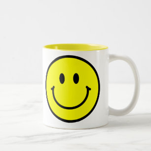 Taza de café feliz de la cara