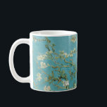 Taza De Café Flores de almendra por Vincent van Gogh<br><div class="desc">Almond Blossoms de es un grupo de varios cuadros de 1888 y 1890 de Vincent van Gogh en Arles y Saint-Rémy, al sur de Francia, de almendros florecientes. Los árboles floridos fueron especiales para Van Gogh. Representaban el despertar y la esperanza. Los disfrutó estéticamente y encontró alegría al pintar árboles...</div>
