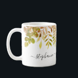 Taza De Café Foliage de otoño de acuarela personalizada<br><div class="desc">Esta jarra floral está decorada con una vegetación eucalíptica en tonos otoñales. Personalizable fácilmente con su nombre o monograma. A medida que creamos nuestra obra de arte no encontrarás esta imagen exacta de otros diseñadores. Acuarela original © Michele Davies.</div>