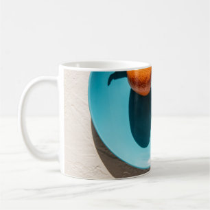 Taza De Café fruta naranja en placa