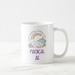 Taza De Café Funny Unicornio Magical AF con decoraciones Girly<br><div class="desc">Una taza de café con un diseño lindo y divertido. Un uncorn blanco con una manga y una cola de colores pastel y tres pequeñas estrellas en la espalda. Un arcoiris colorido sobre el cielo. Rodeada de una corona circular compuesta de nubes, corazones y flores para un toque más jovial....</div>