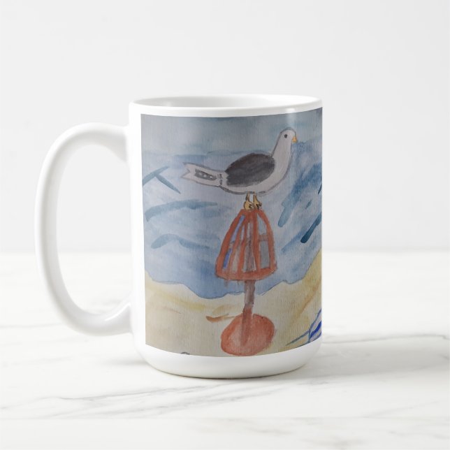 Taza De Café Gaviota En El Bloque De Playa (Izquierda)