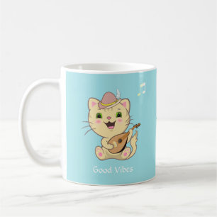 Taza De Café Gengibre musical feliz con gato sobre azul claro