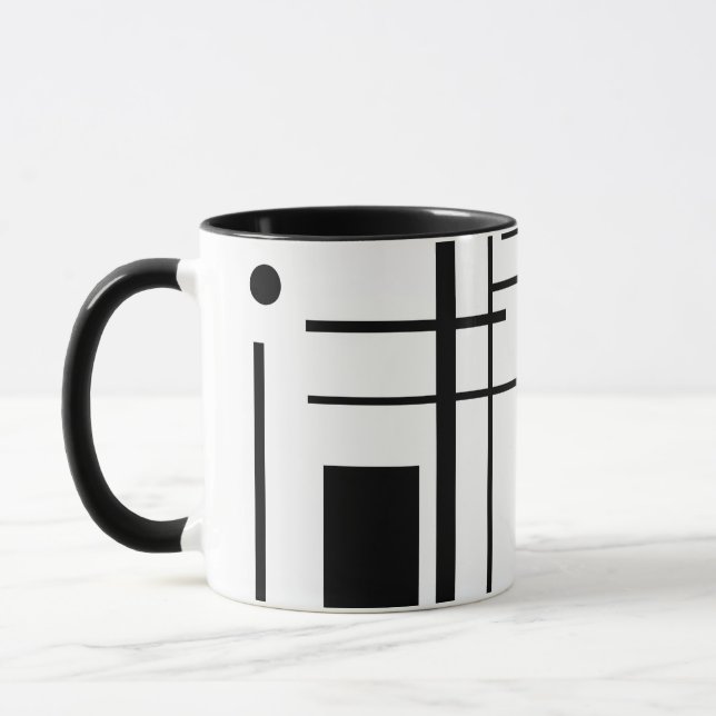 Taza de café geométrica blanco y negro de las (Izquierda)