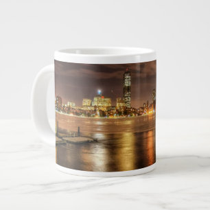 Taza De Café Gigante Hielo derretido parcialmente en el río Charles en