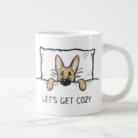 Perro pastor alemán lindo envuelto en cama