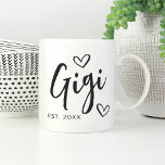 Taza De Café Gigi Año Abuela establecida<br><div class="desc">Crea un dulce bigote para la abuela con este sencillo diseño que incluye "Gigi" en letras manuscritas dibujadas a mano acentuadas con el corazón. Personaliza el año en que se convirtió en abuela para un lindo Día de la Madre o un regalo de invitación por embarazo.</div>