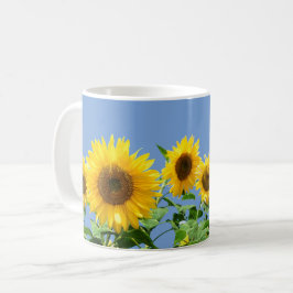 Taza De Café Girasoles sobre azul cielo