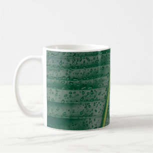 Taza De Café Gotas de agua en hojas de banano