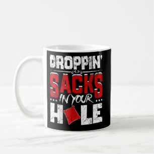 Taza De Café Gracioso Equipo De Cornhole Cae Sacos En Tu Agujer