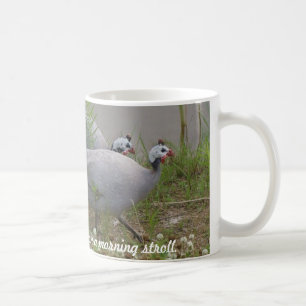 Taza De Café Guinea del coral y de la lavanda en una mañana…