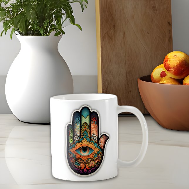 Taza De Café Hamsa Hand Classic Mug, 11 oz (Hamsa hand coffee mug sits on a kitchen counter)