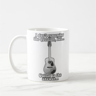 Taza De Café I don't remember the question but guitar is answer