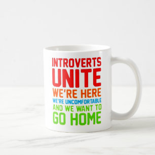 TAZA DE CAFÉ INTROVERSIONES A MENOS QUE ESTAMOS AQUÍ SOMOS INCÓ