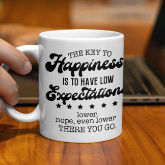 Taza De Café La clave para la felicidad, la baja expectativa di