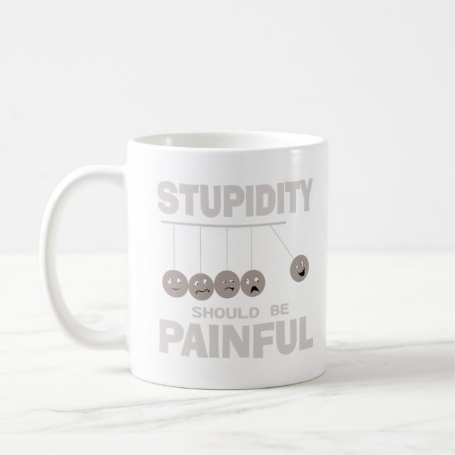 Taza De Café La estupidez debería ser un humor gracioso y graci (Izquierda)
