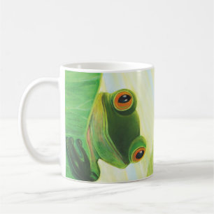 Taza De Café La rana verde de ojos grandes detrás de la almohad