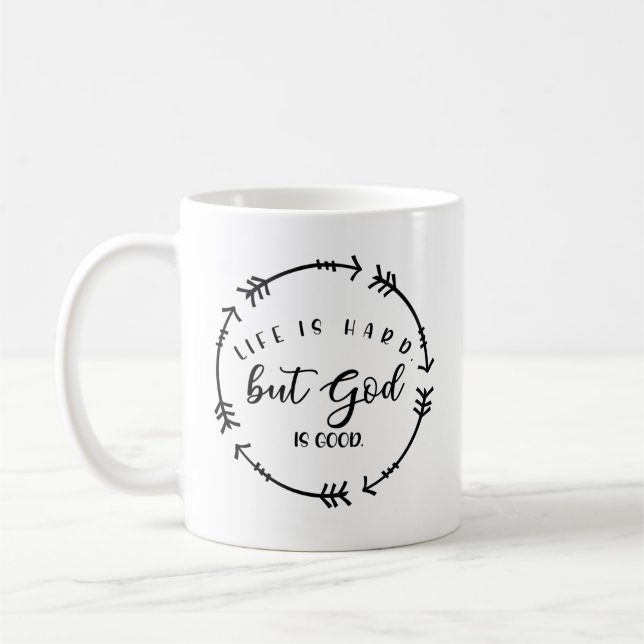 Taza De Café La vida es dura pero Dios es bueno (Izquierda)
