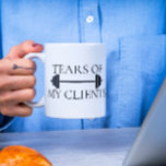 Taza De Café Lágrimas de mi cliente: Trainer personal Barbell<br><div class="desc">Este diseño puede ser personalizado en el área proporcionada cambiando la foto y/o el texto. O puede personalizarse haciendo clic en Personalizar esta plantilla y, a continuación, eligiendo la opción de hacer clic en el personalizar y eliminando o cambiando el color del fondo, agregando texto, cambiando el color o estilo...</div>