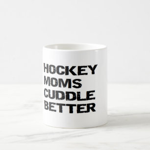 TAZA DE CAFÉ LAS MAMÁES DEL HOCKEY SOBRE HIELO ABRAZAN MEJOR