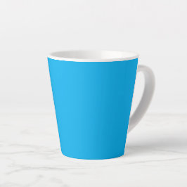 Taza De Café Latte Un fondo azul sólido vibrante llena el marco