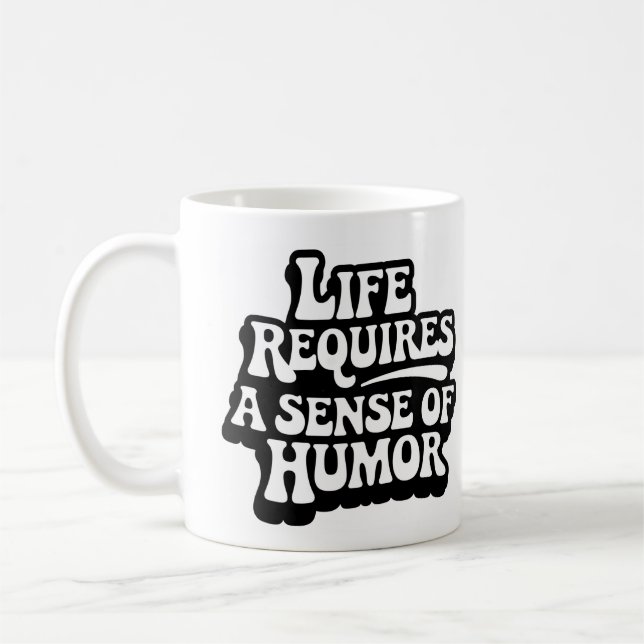 Taza De Café "Life Requires A Sense Of Humor" (Izquierda)