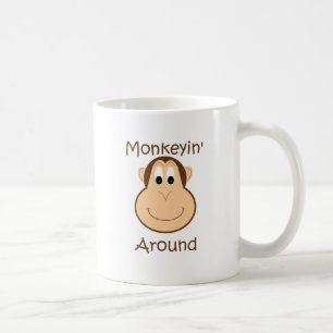 Taza de café linda del chimpancé