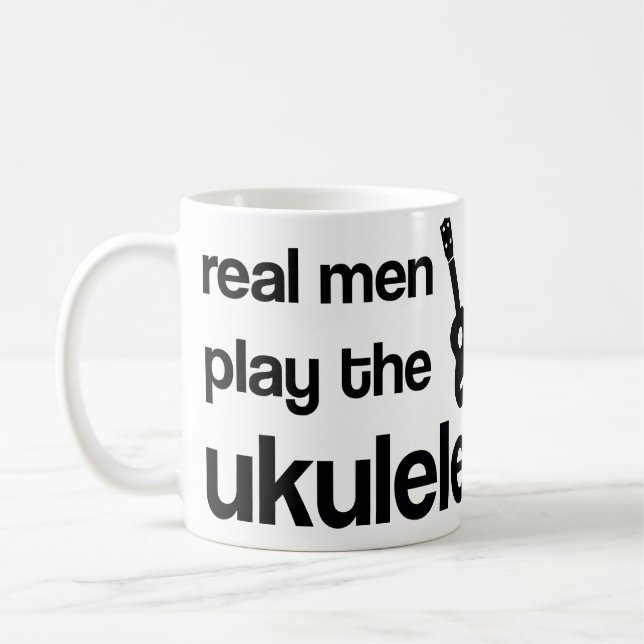 TAZA DE CAFÉ LOS HOMBRES REALES JUEGAN EL UKULELE (Izquierda)