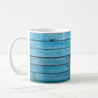 Taza De Café Madera natural azul, fondo texturado.