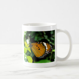 Taza De Café Mariposa naranja, negra y blanca en hoja