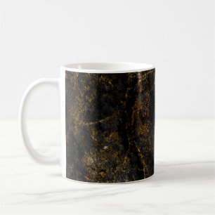 Taza De Café Mármol negro, venas doradas, textura.