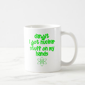 Taza De Café Materia nuclear en las manos