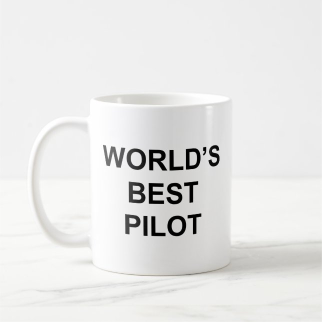 Taza De Café Mejor oferta graciosa del piloto mundial con texto (Izquierda)