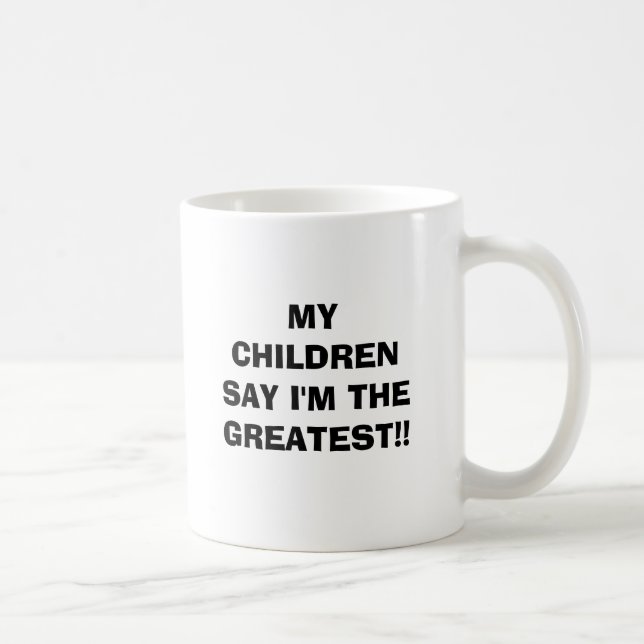 Taza De Café ¡MIS NIÑOS DICEN que soy EL MÁS GRANDE!! (Derecha)