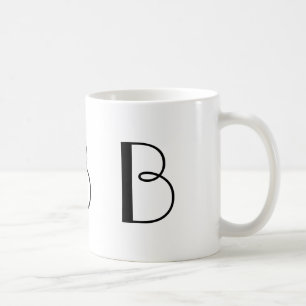 Taza de café moderna blanco y negro del monograma