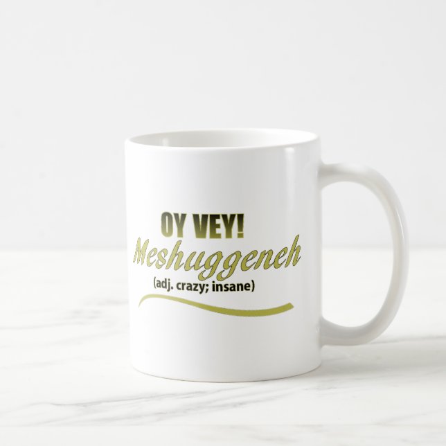 TAZA DE CAFÉ MUCHAS FRASES MESHUGGENEH (Derecha)