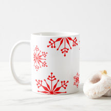 Mug festivo con copos de nieve rojos.
