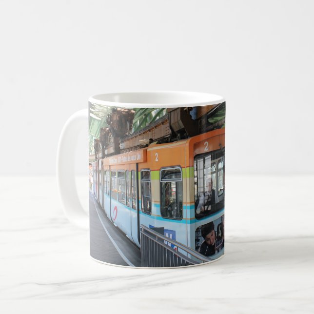 Taza De Café Naranja Blue Wuppertal Floting Train (Anverso izquierdo)
