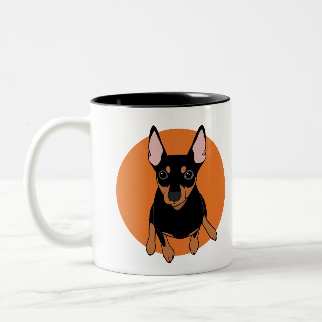Taza de café negra del perro del Pinscher (Izquierda)