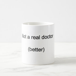Taza De Café "No un médico real" PhD