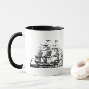 Taza de café nostálgica del velero de la playa del