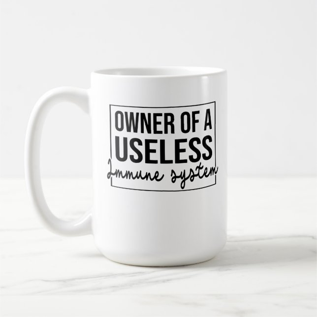 Taza De Café Owner Of A Useless Immune System (Izquierda)