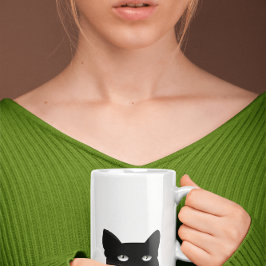 TAZA DE CAFÉ PELEANDO EL BARRO DE CAFÉ DE GATO NEGRO